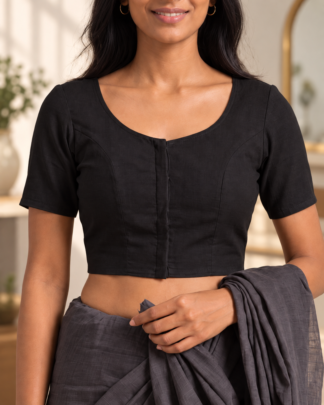 Classic black front-hook saree blouse in cotton, close-up of scoop neckline and front-hook fastening